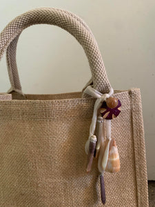 Jute bag with tassel accent